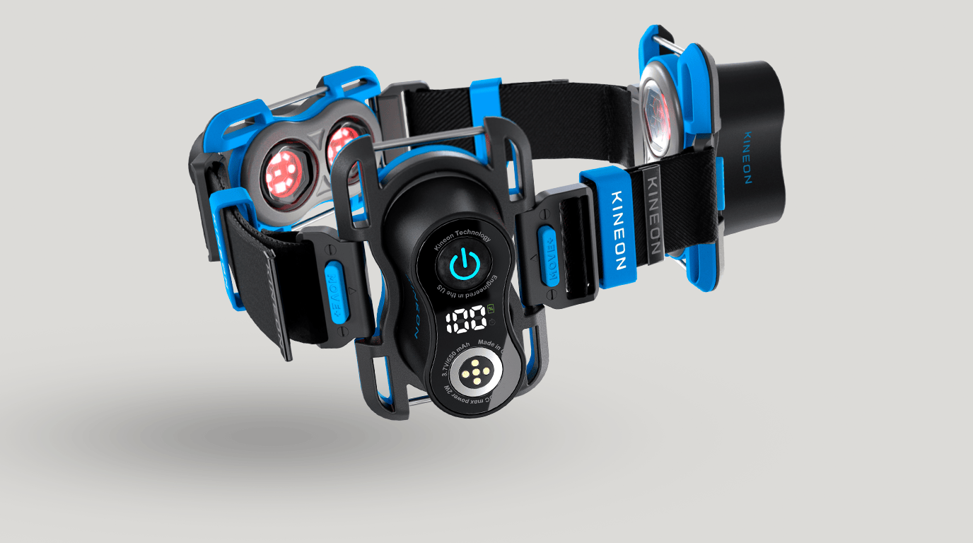 Kineon MOVE+ hero product shot on a dark background — flagship red and infrared laser therapy device for knee pain